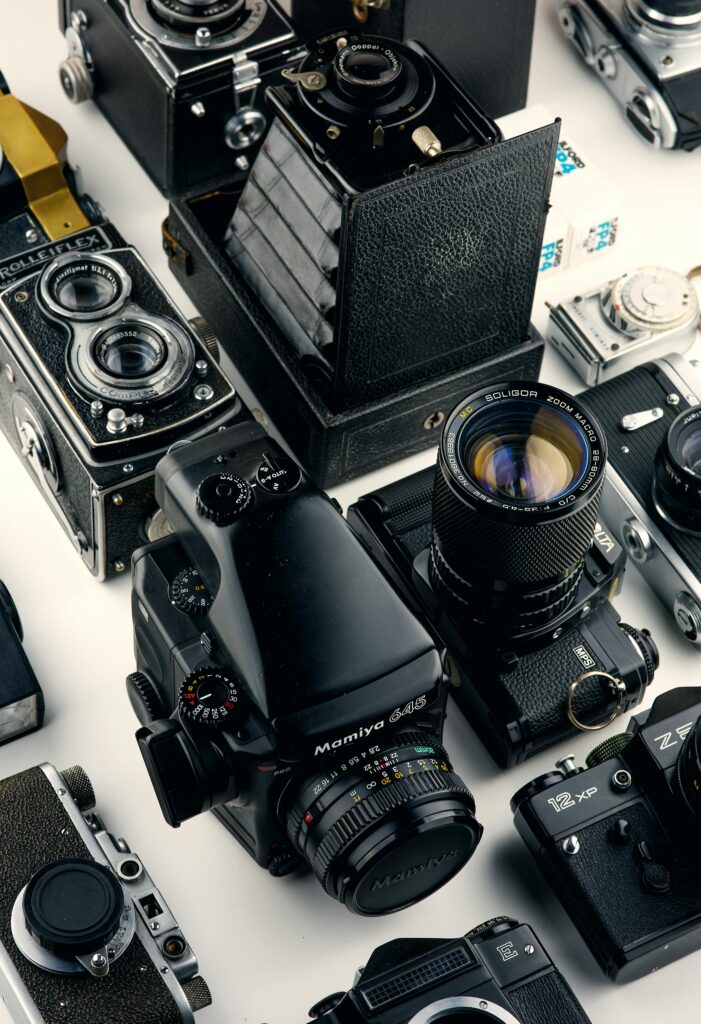 Explore a diverse array of vintage and modern cameras showcasing timeless photography technology.